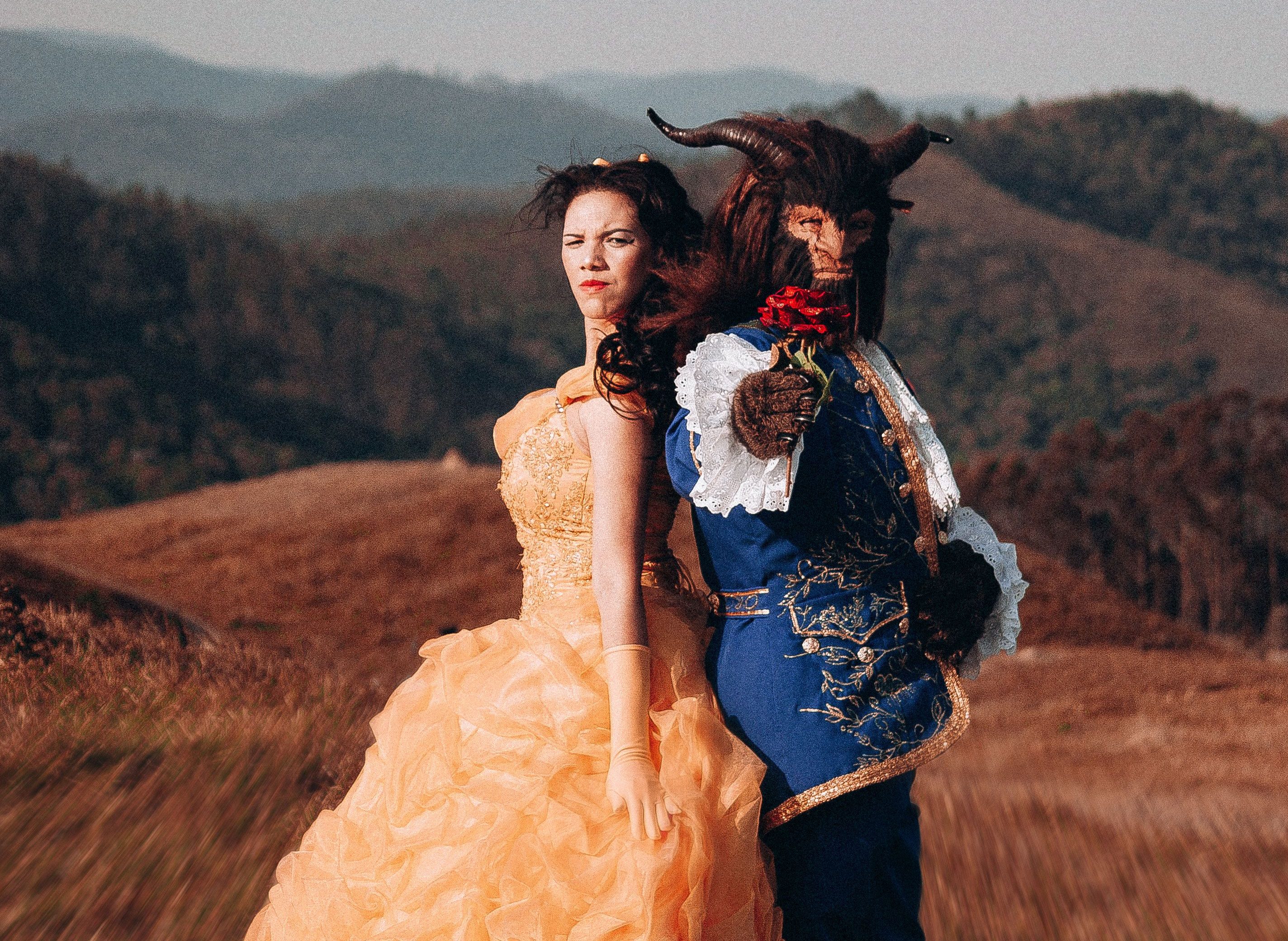 beauty and the beast standing back to back